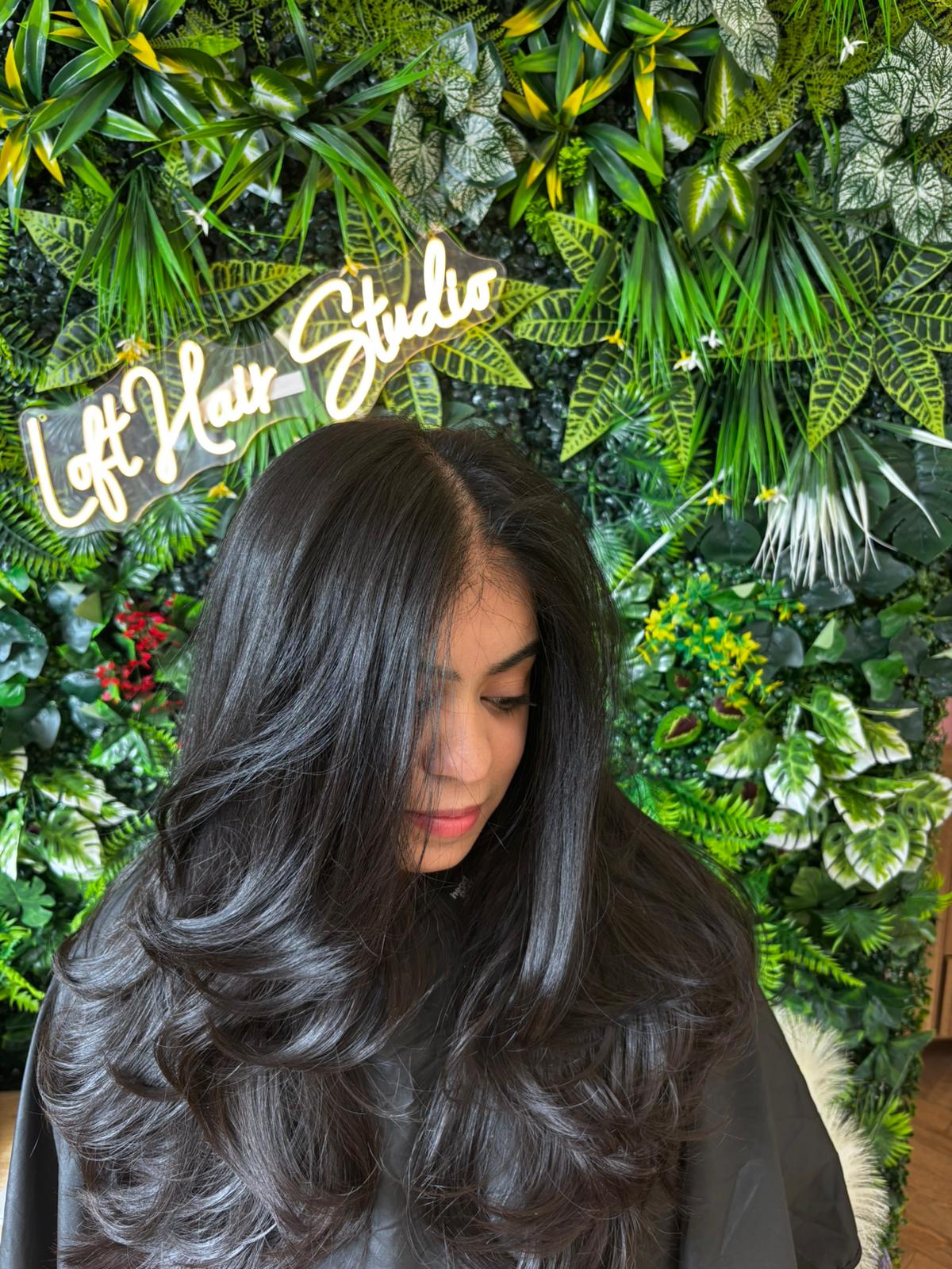 Glossy layered hairstyle at The Loft Hair Studio